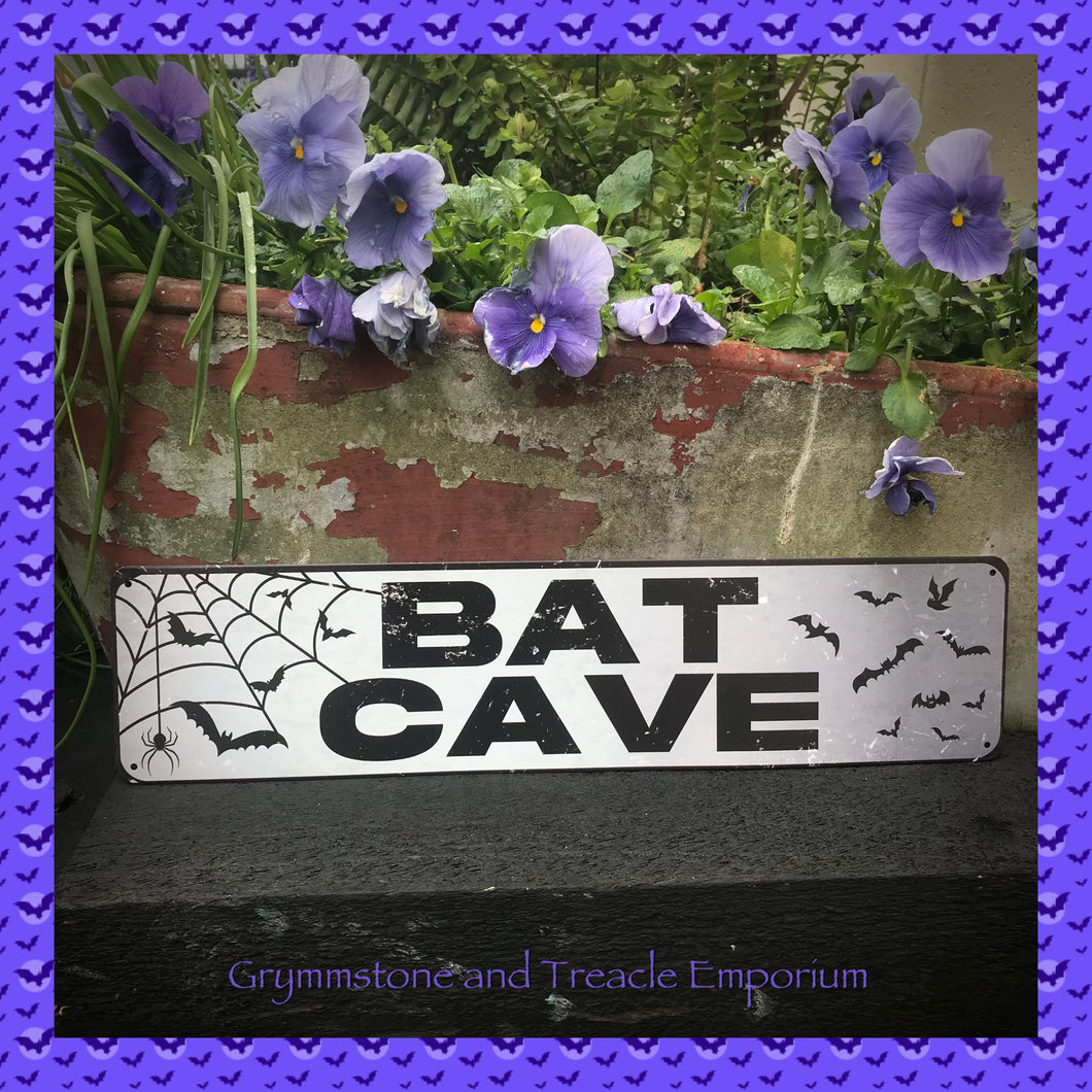 Bat Cave Metal Sign