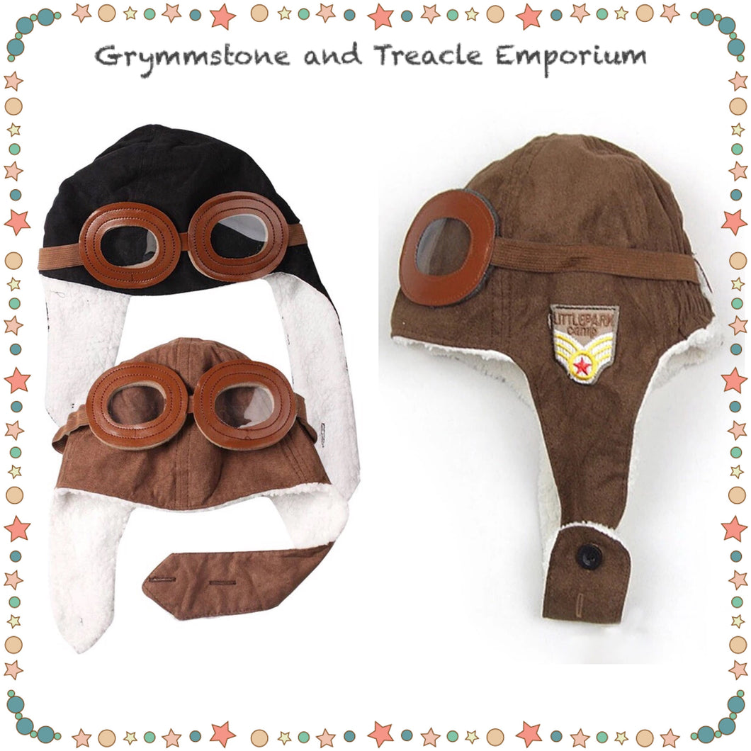 Adorable wooly beanie for wee ones, made to look like an aviators hat, with little foam goggles and ear flaps