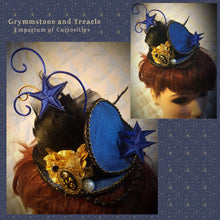 Blue and Gold round steampunk fascinator with blue stars