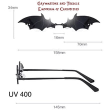 Photo of Gothic Sunglasses with Bat shape showing measurments 
